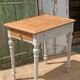 Antique drawer table with a patina.