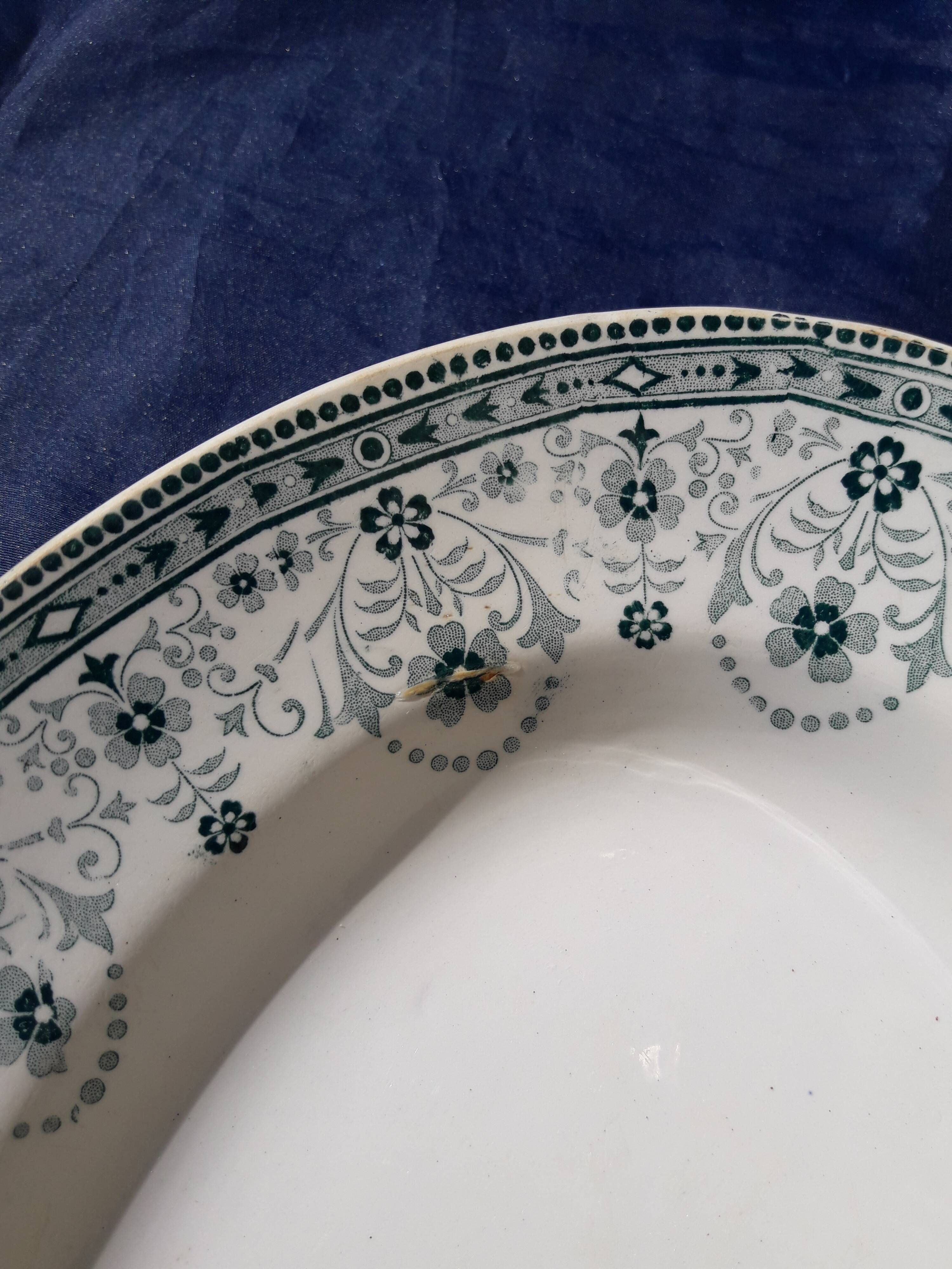 Oval plate in st. Amand earthenware and Hamage Iron Earth model Marceau L 33.5 cm
