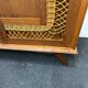 Armoire rotin pieds compas