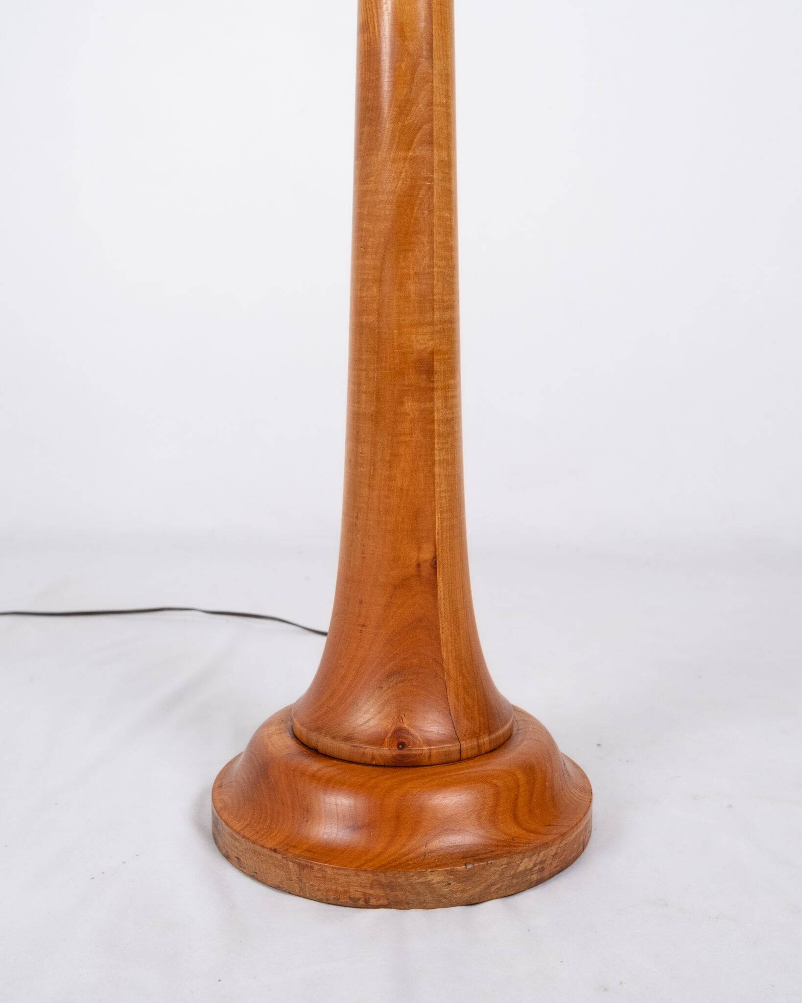 Pair of turned wooden floor lamps in Art Deco style, France, mid-20th century.