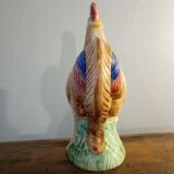 Vintage slipware jug in the shape of a rooster.