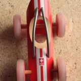 Jouet en bois E Racer Hape formule 1 en bambou rouge