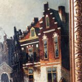 Dutch street scene oil painting in ornate frame signed Nijland