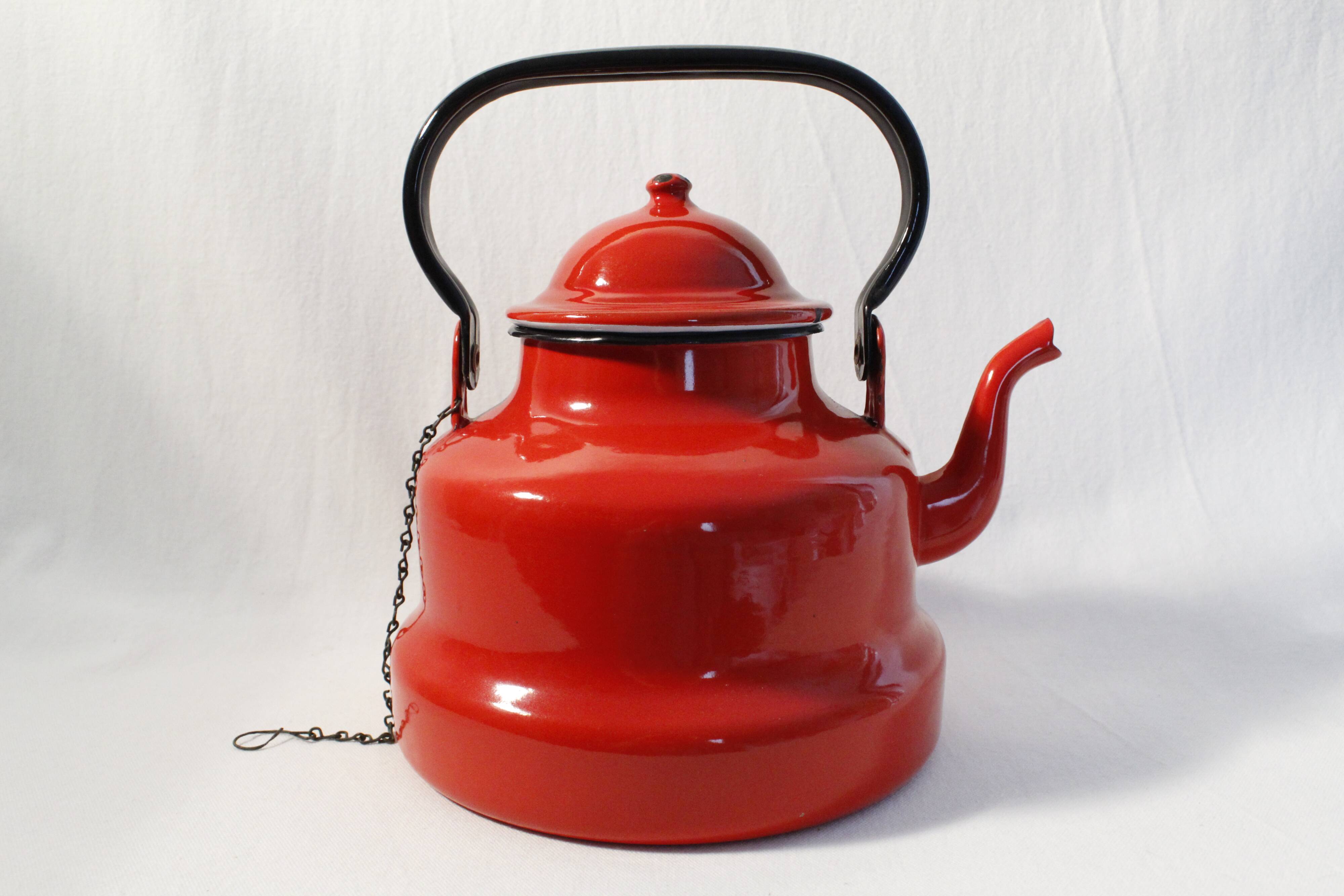 Vintage red enamelled metal kettle