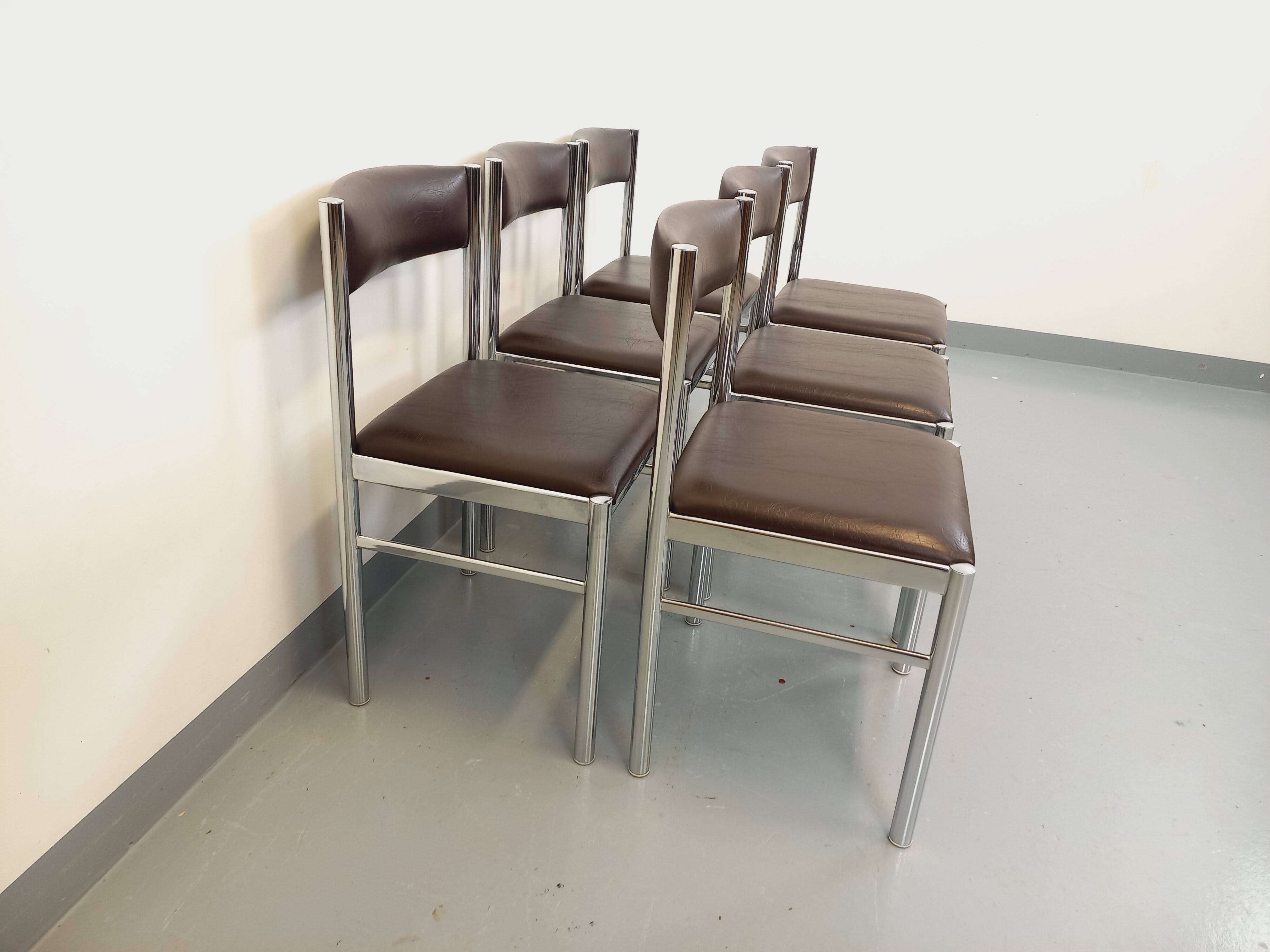 Set of 6 vintage chairs from the 70s in chrome metal and brown faux leather.