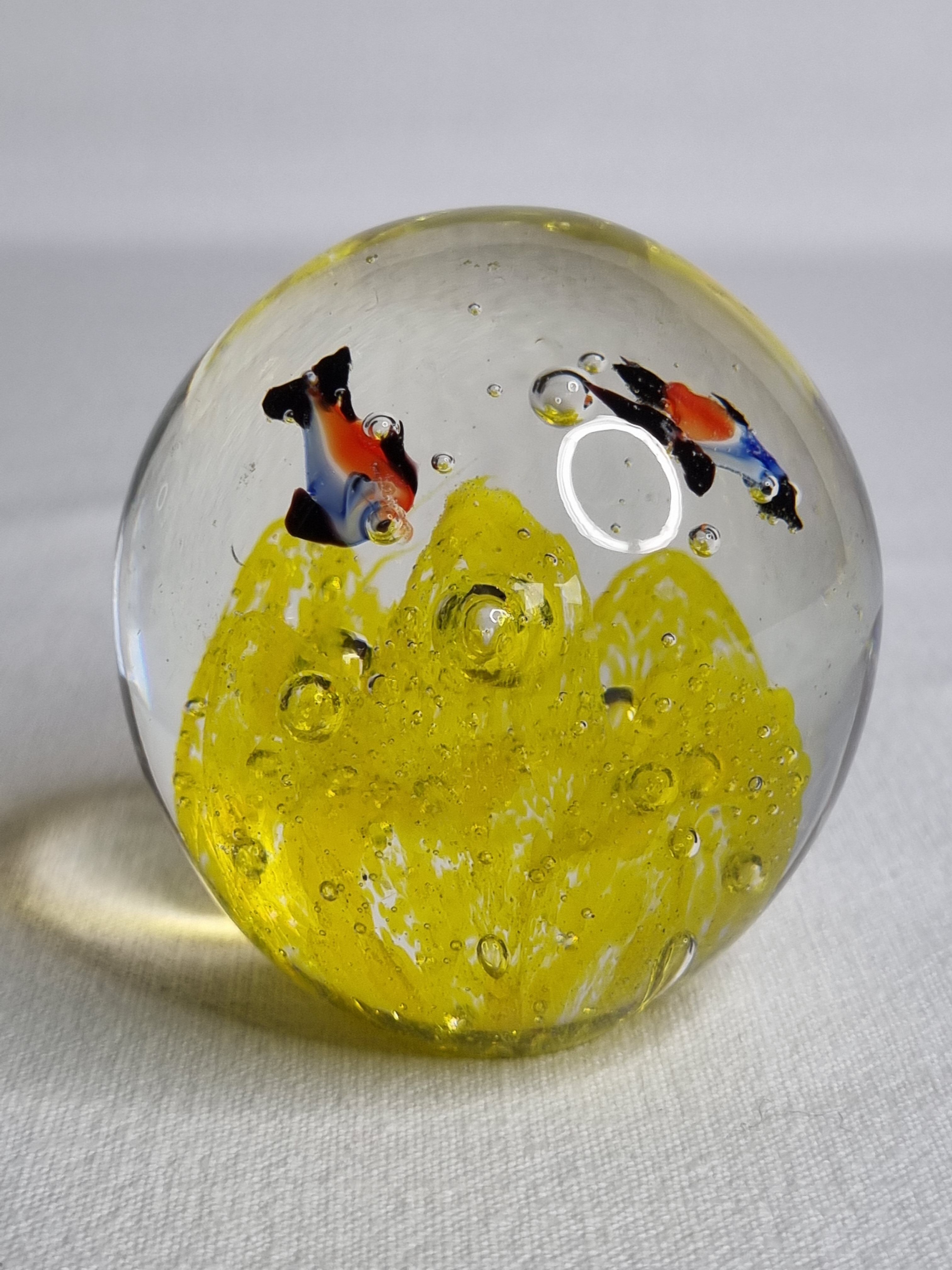 Set of two sulphides, glass paperweight with fish decorations