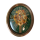 Domed glass frame with its bouquet of dried flowers