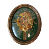 Cadre en verre bombé avec son bouquet de fleurs séchées