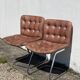 Paire de chaises en cuir par Robert Haussman