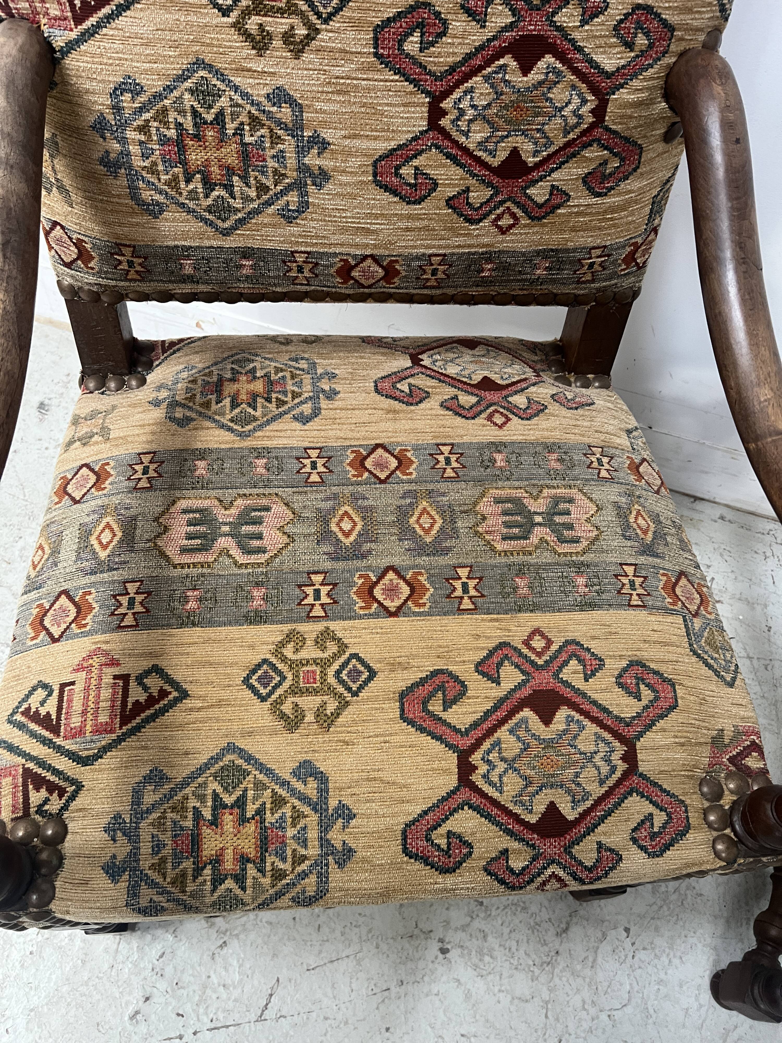 Paire de fauteuils de style Louis XIII a haut dossiers plats XX siècle