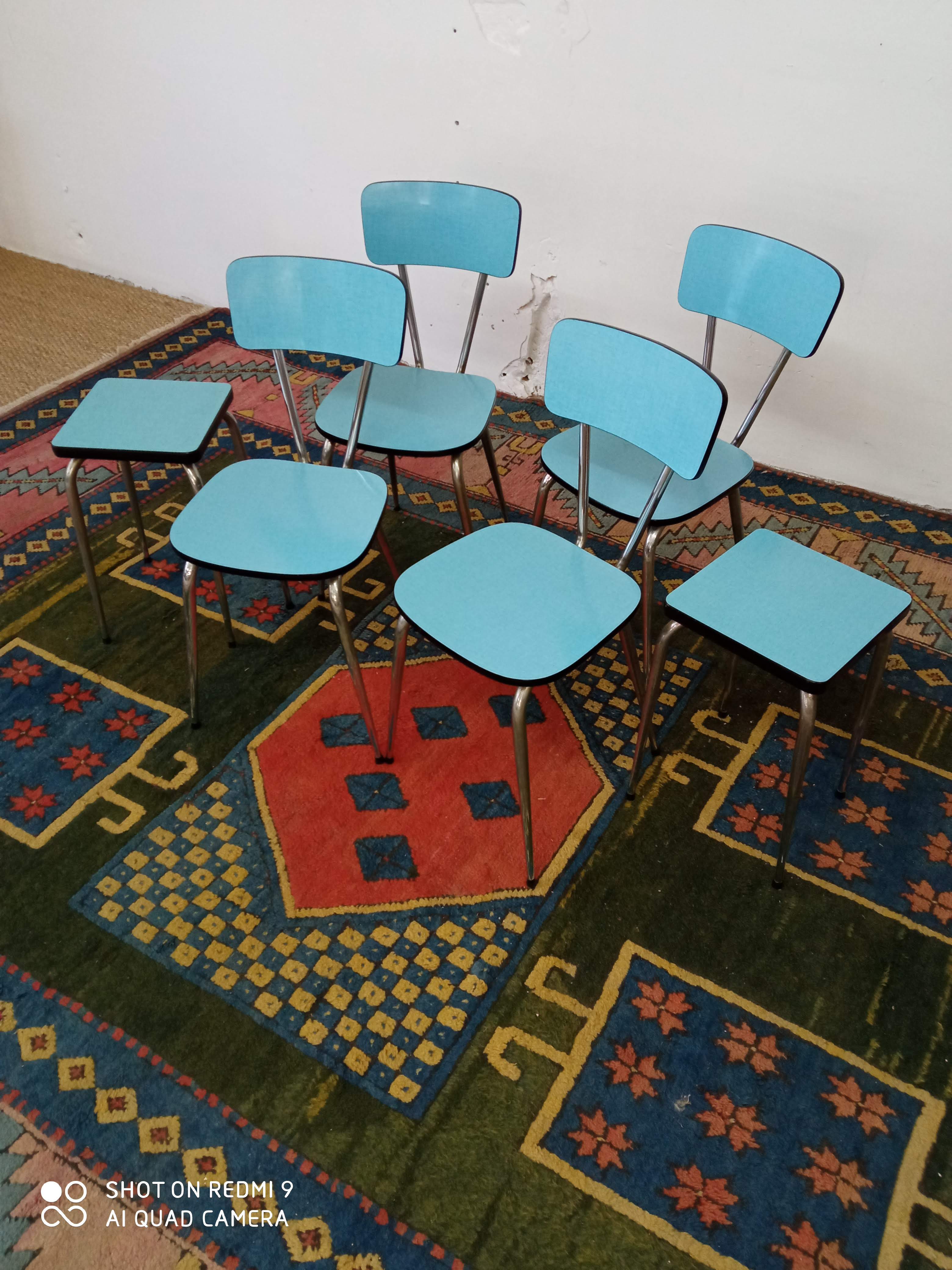 Blue formica chairs and stools
