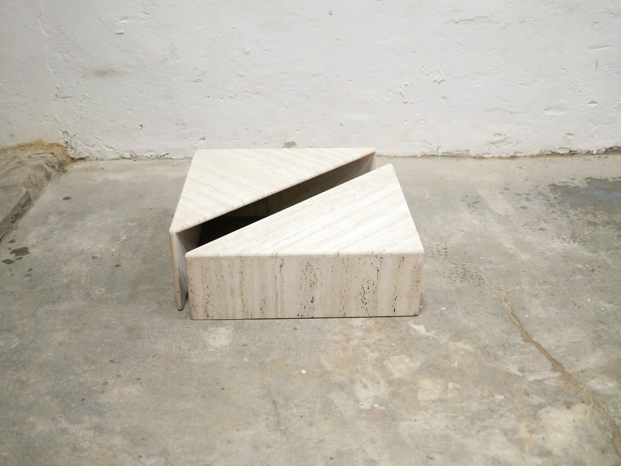 Series of 2 vintage travertine coffee tables published by Roche Bobois