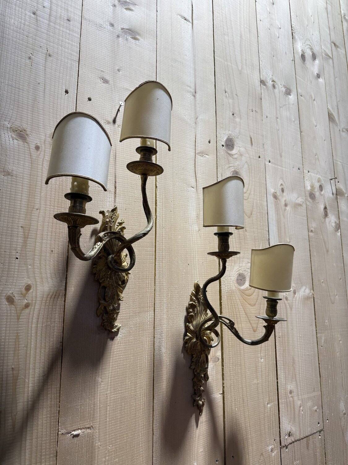 Pair of Louis XV style Rocaille wall sconces in bronze
