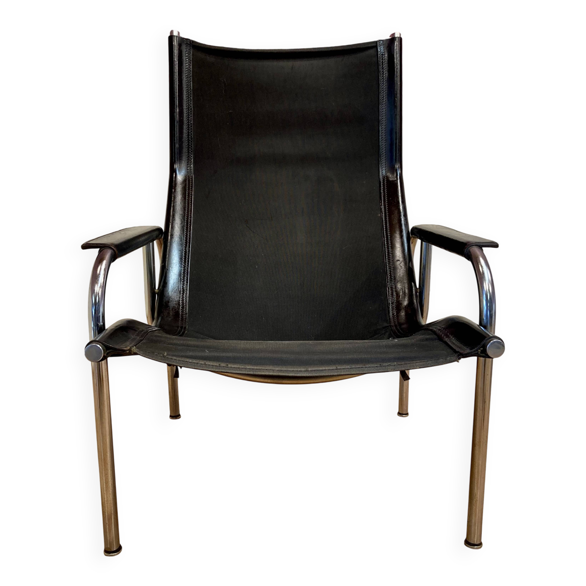Black leather reclining lounge chair, "Hans Eichenberger" design, 1960.