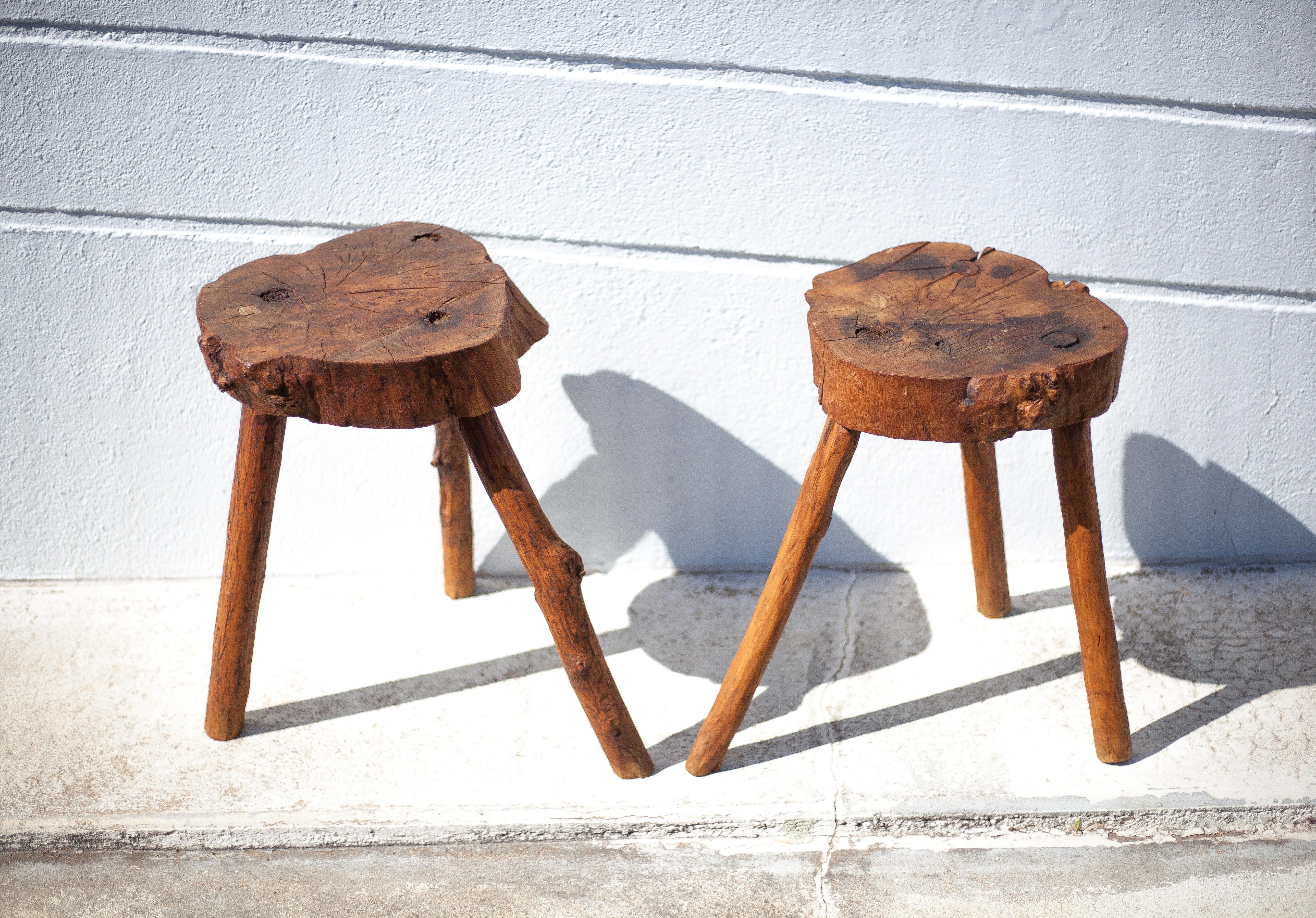 Pair of brutalist tripod wood stools