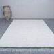 Handmade natural wool rug in green and white, 150x250 cm.