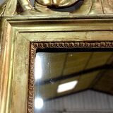 Miroir en bois doré, style Louis XVl, début XXe