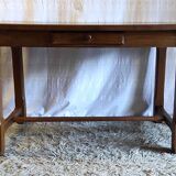 Table style farmhouse table in solid wood.