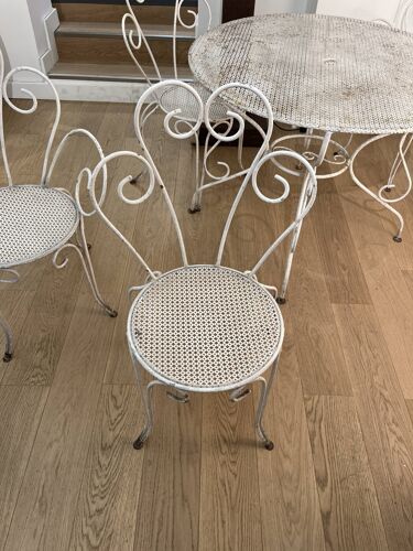 Set garden table and 4 wrought iron chairs