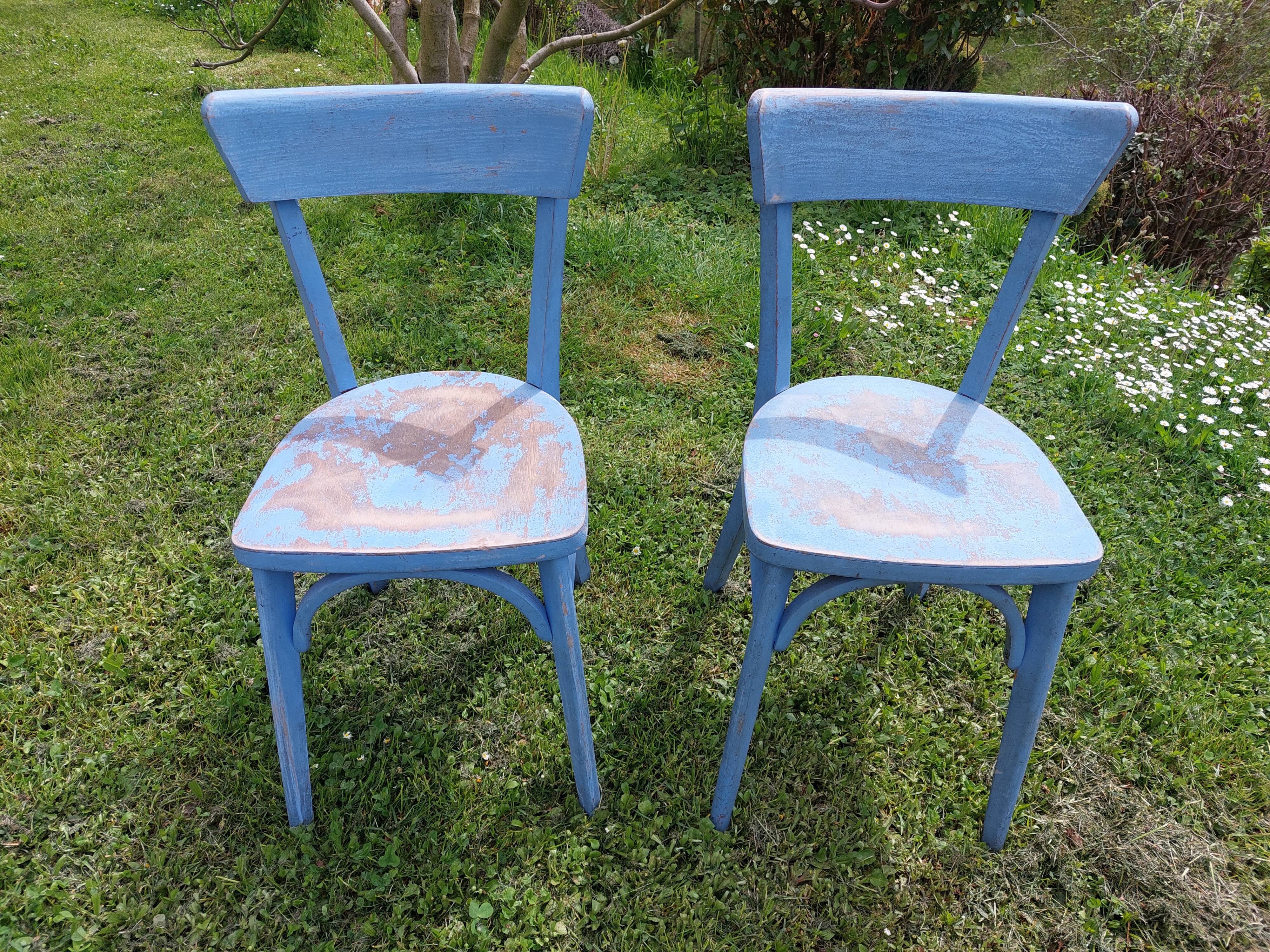 pair of chippy blue paint bistro chairs