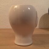2 black and white ceramic head vases, face