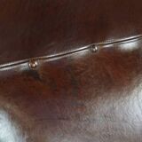 Comfortable and correct dark antique sheepskin English armchair in very good condition