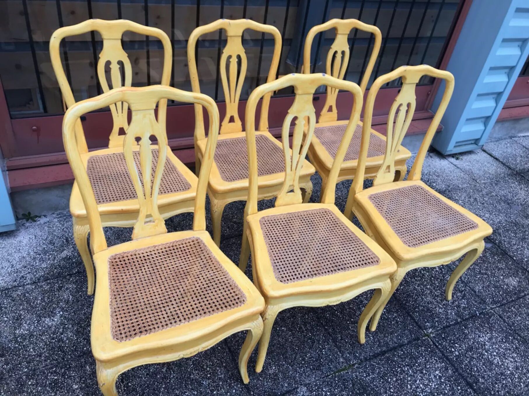 6 yellow canned chairs