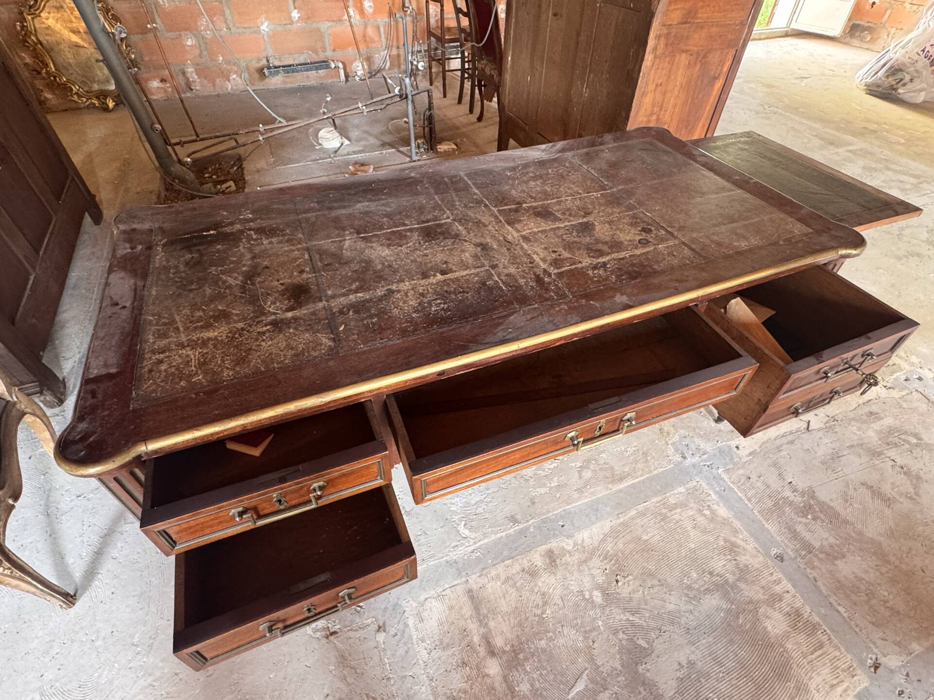 Large flat desk in Louis XVI style made of mahogany, early 20th century.