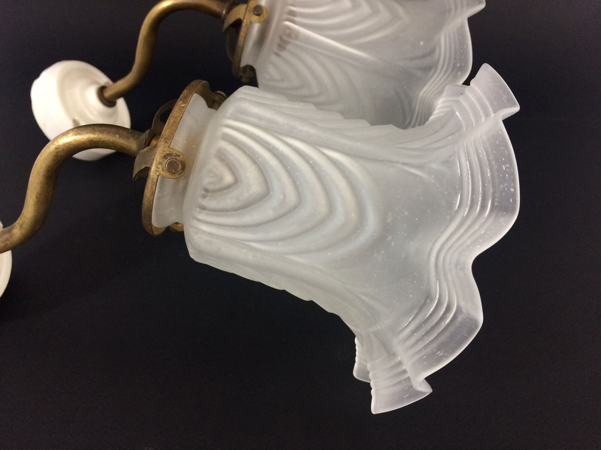 Pair of brass swan collar wall sconces, porcelain fastening. Vintage