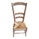Low straw chair called "nurse"
