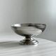 5 silver metal cups.