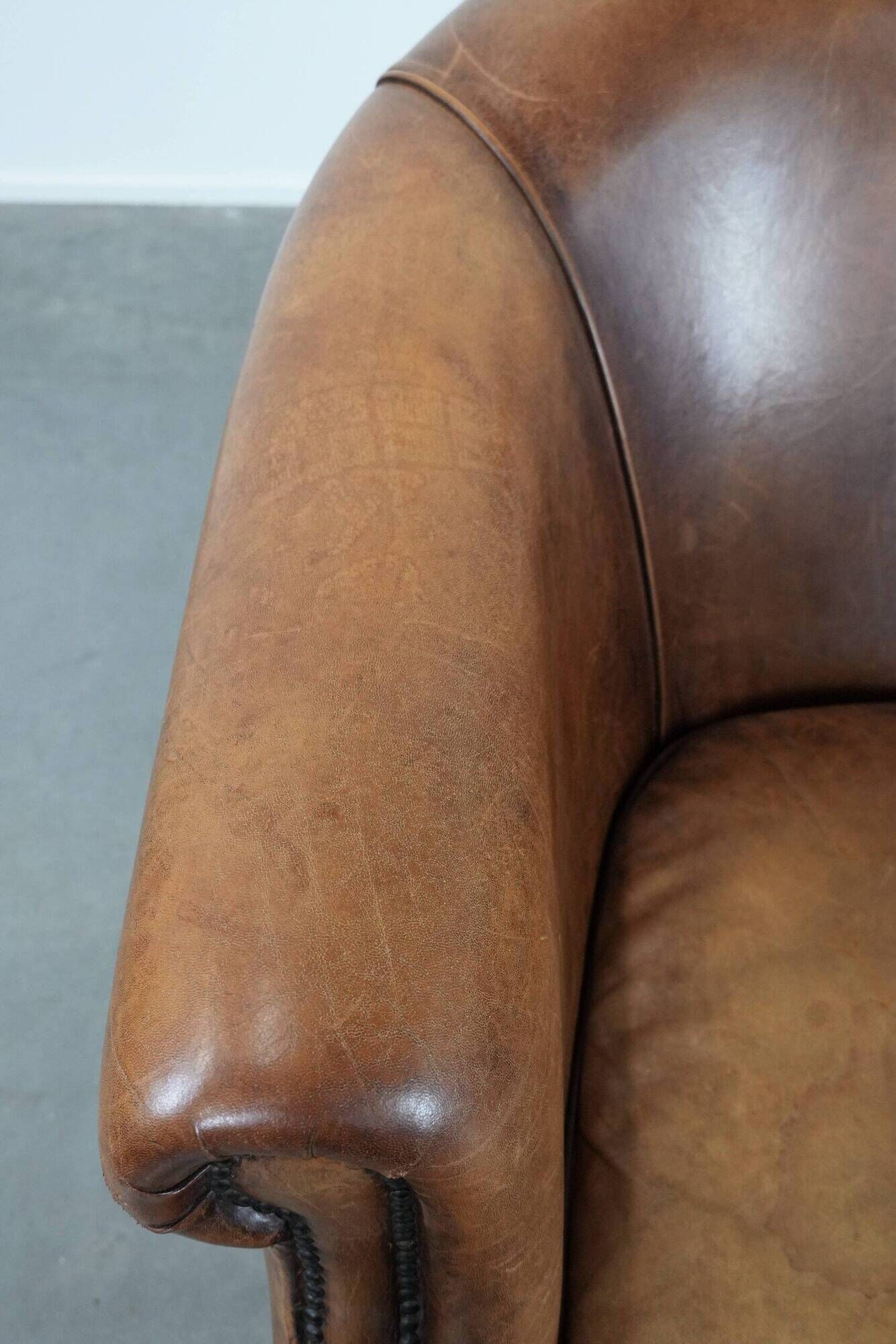 Comfortable club chair made of sheepskin leather