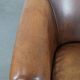 Comfortable club chair made of sheepskin leather