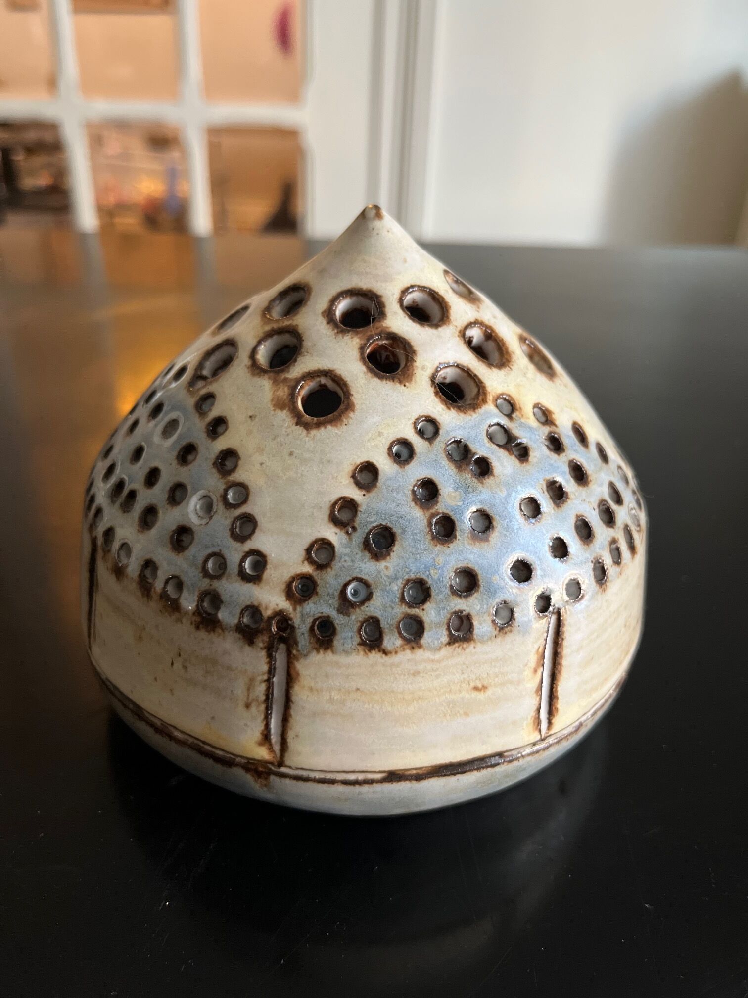 Ceramic flower pique at the old mill