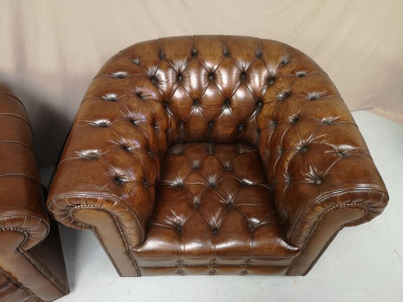 Pair of Chesterfield brown leather armchairs