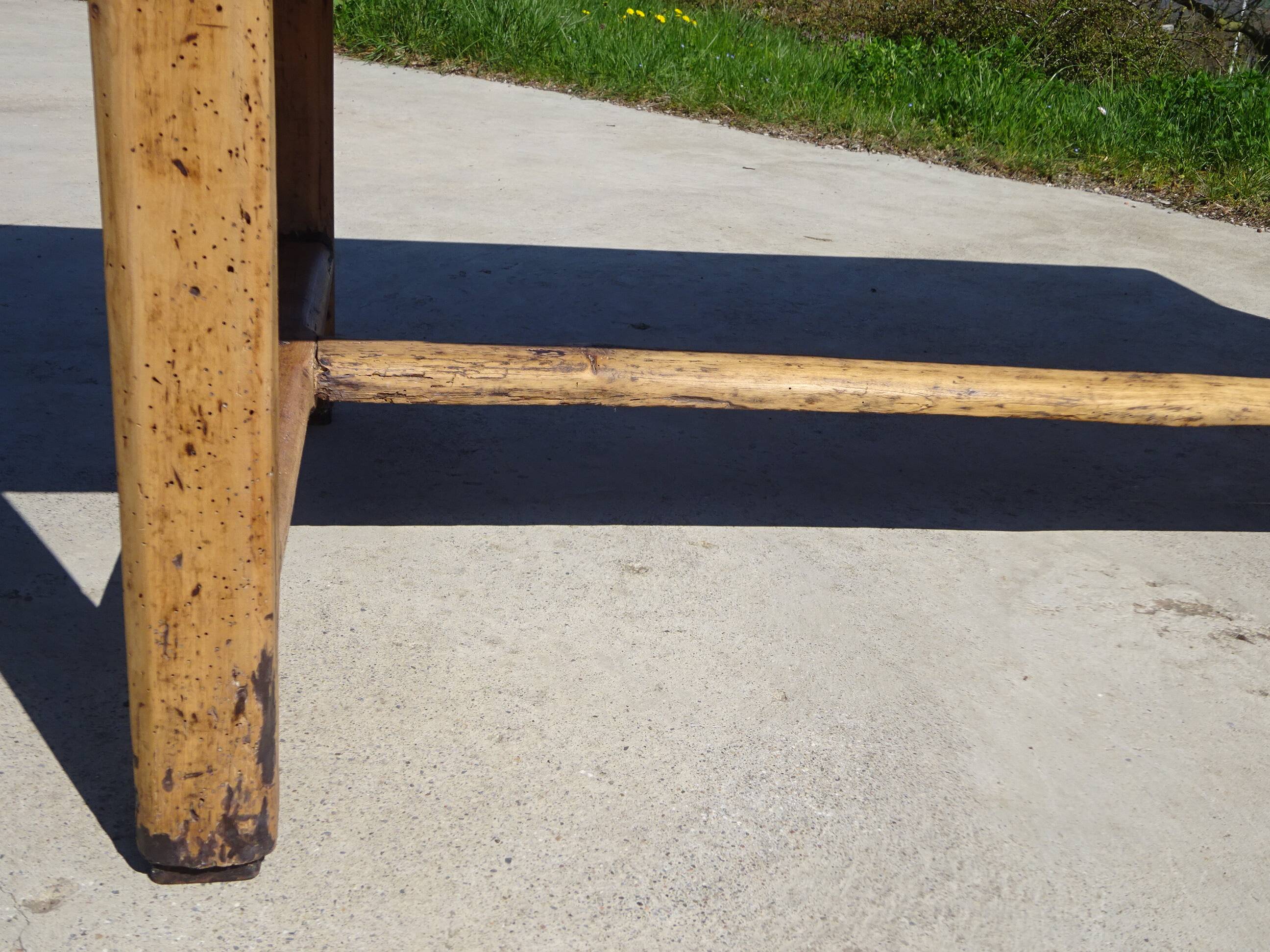 Old farmhouse table made entirely of restored solid oak.
