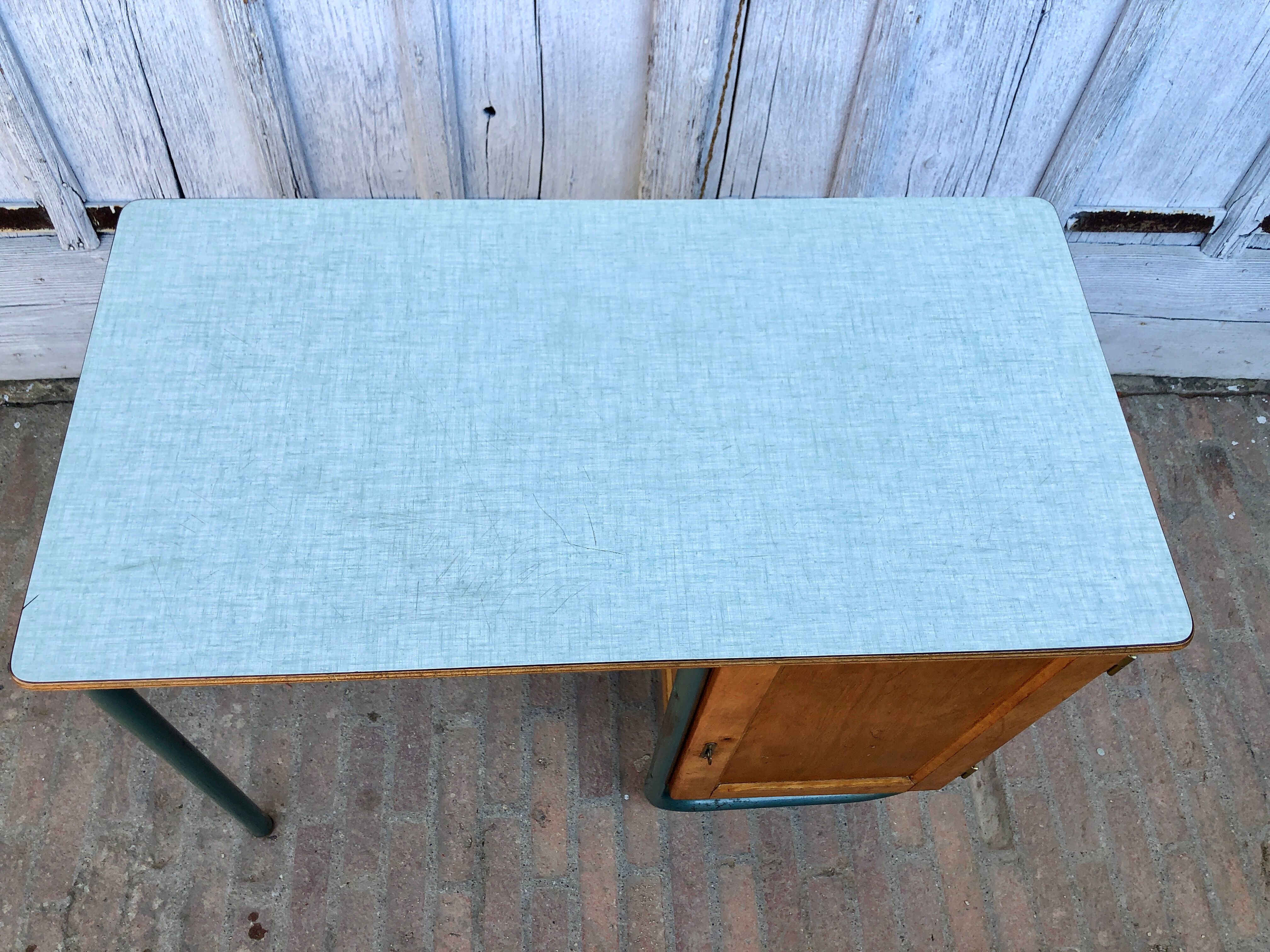 Office 1950 tubular metal and mint green formica