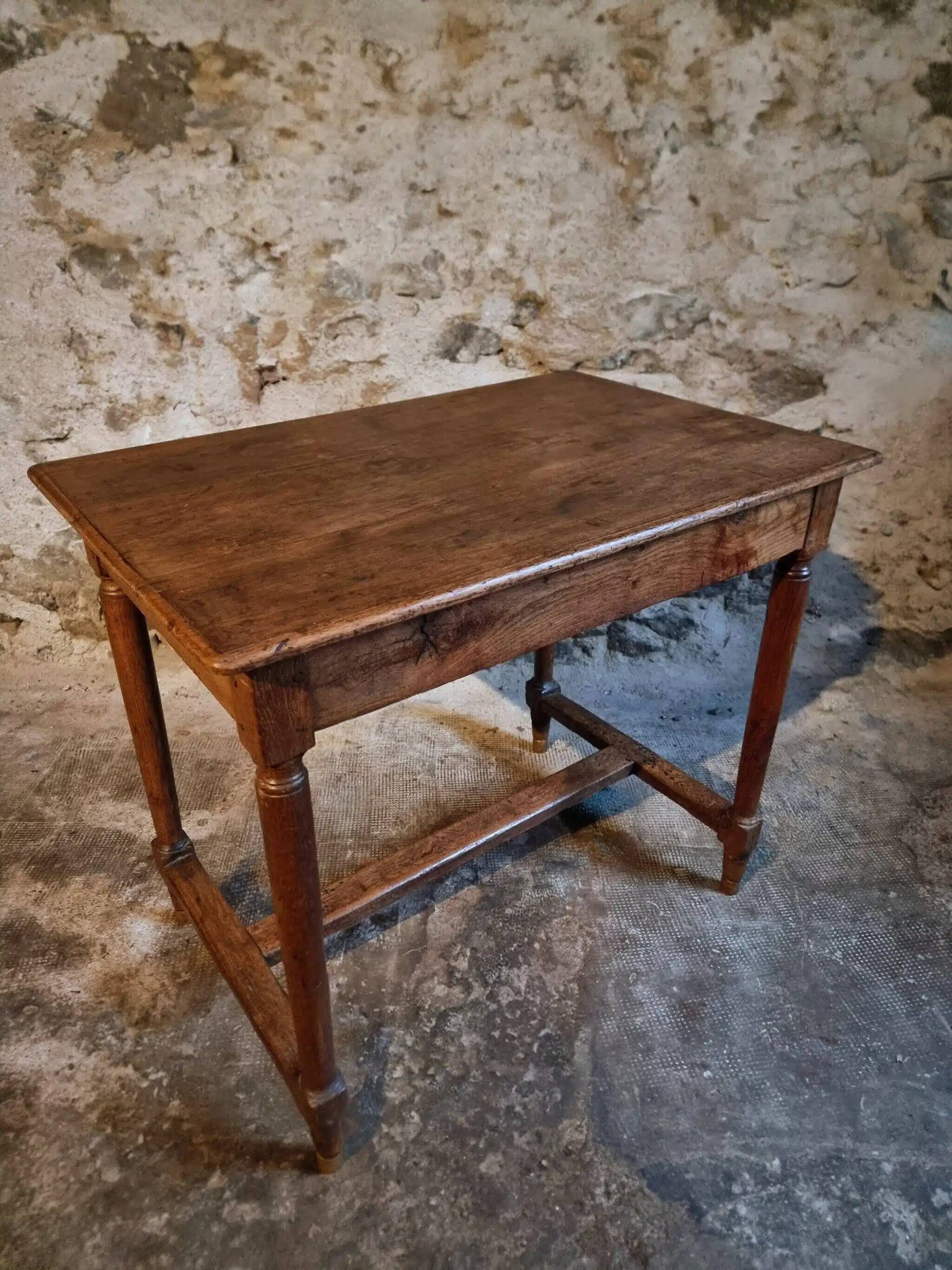 Antique French oak table, writing table from the early 19th century.