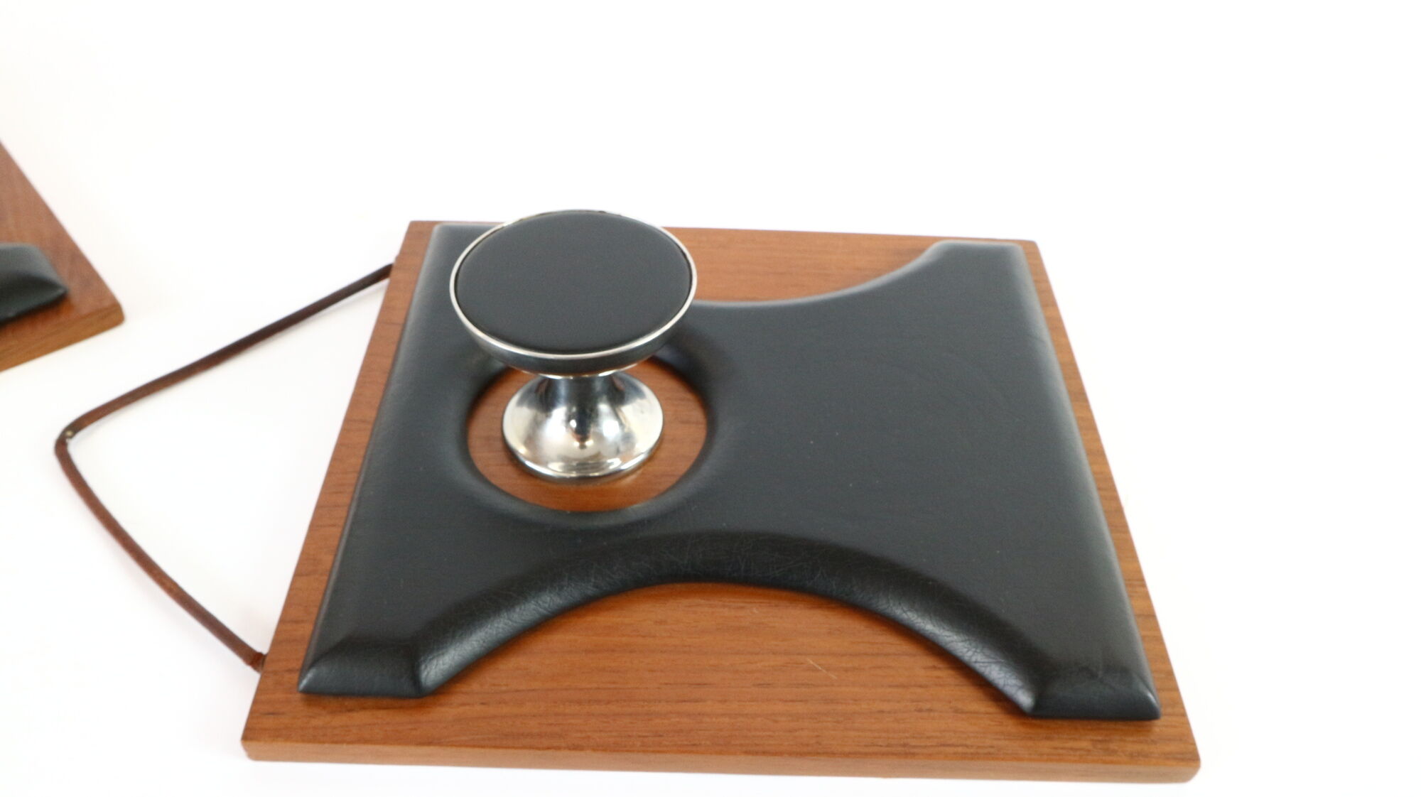 Two coat hangers, wood, leather and black leather, 70s