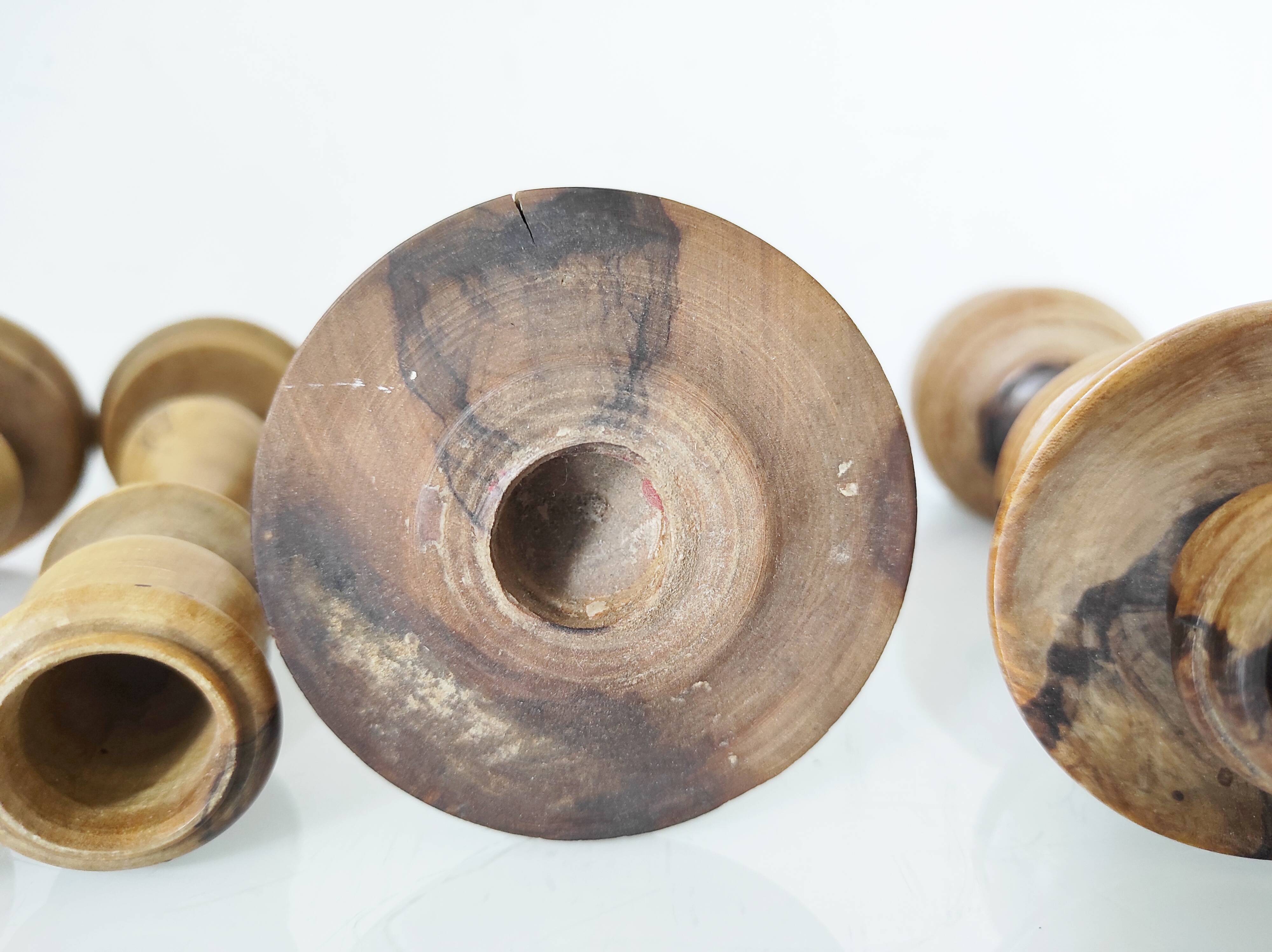 Set of 4 turned wooden candle holders
