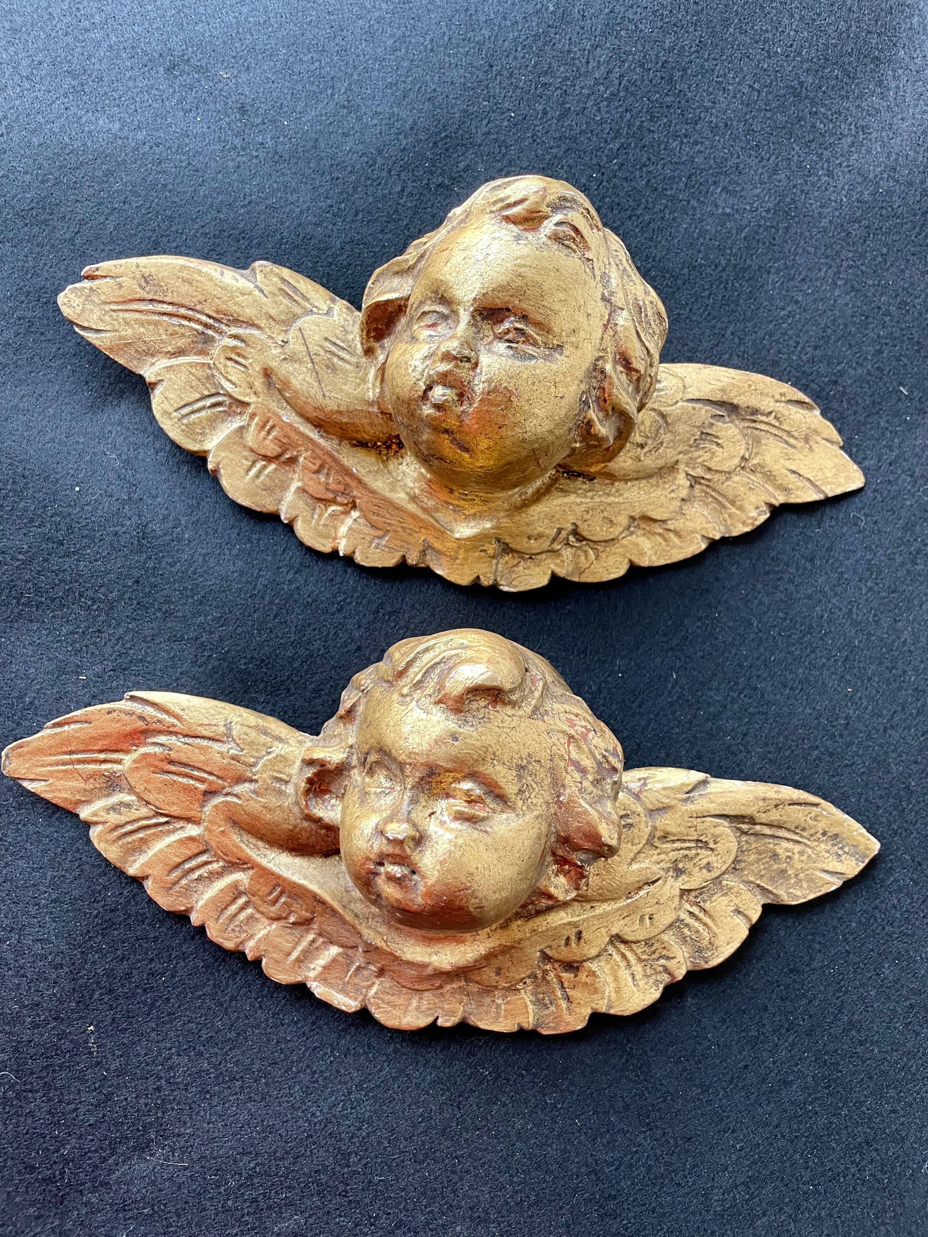 Pair of angels in gilded wood