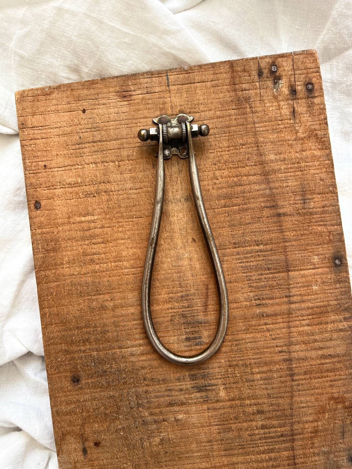 Antique mercury glass barber mirror and carved wooden frame