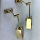 Postmodern pair of articulated brass wall lamps by Baulmann Leuchten. Germany 1980s