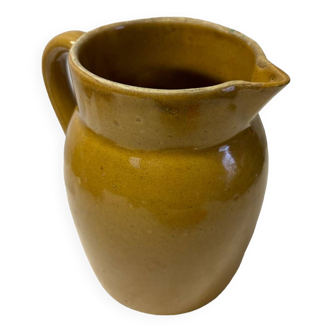 Old yellow sandstone pitcher