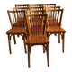 Set of Baumann bistro chairs with a mix of wooden seat and faux leather.