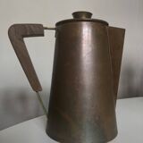 Modernist Italian pitcher design from the 1960s in patinated wood and metal.