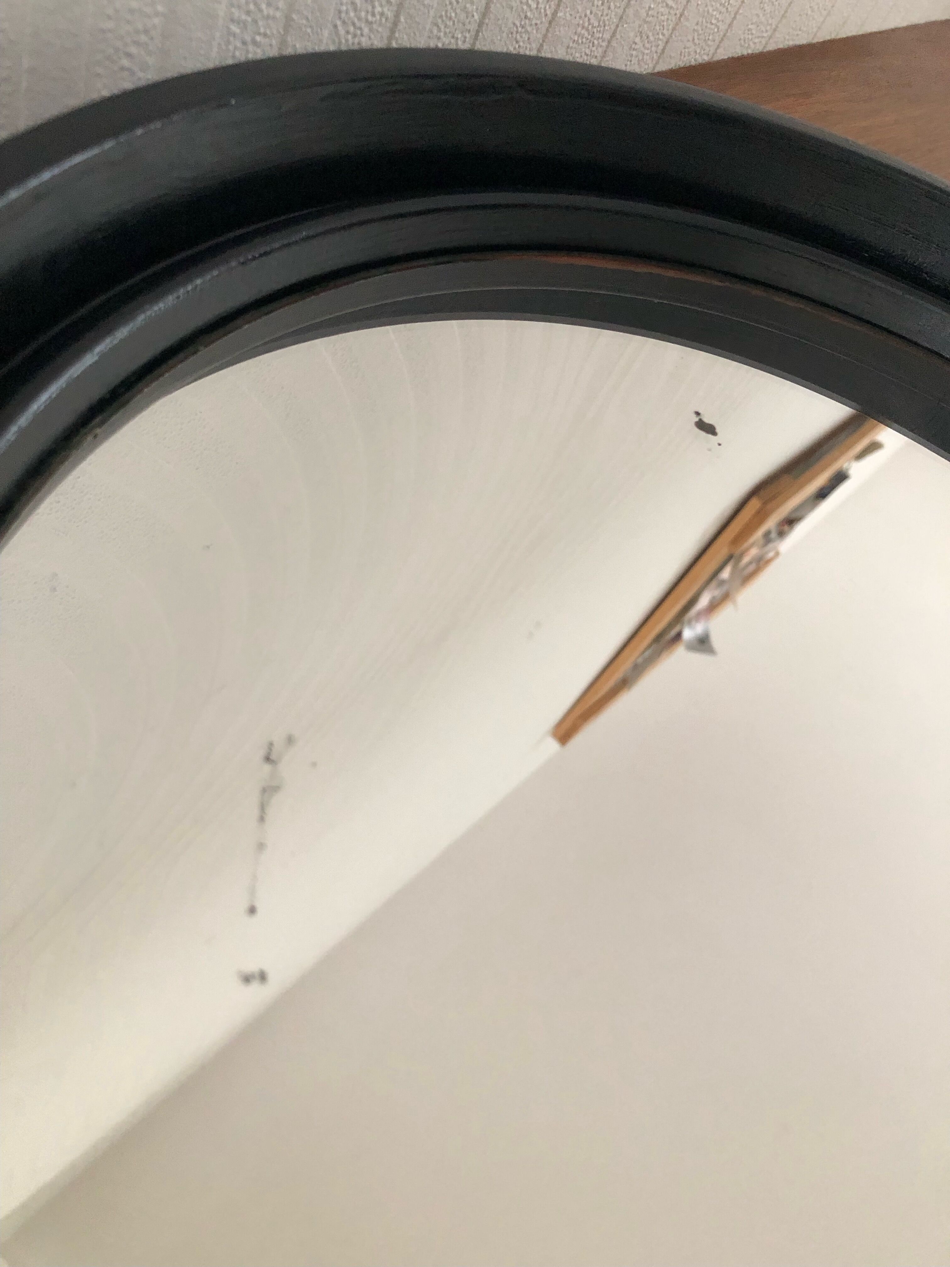 Vintage round mirror in black gilac plastic