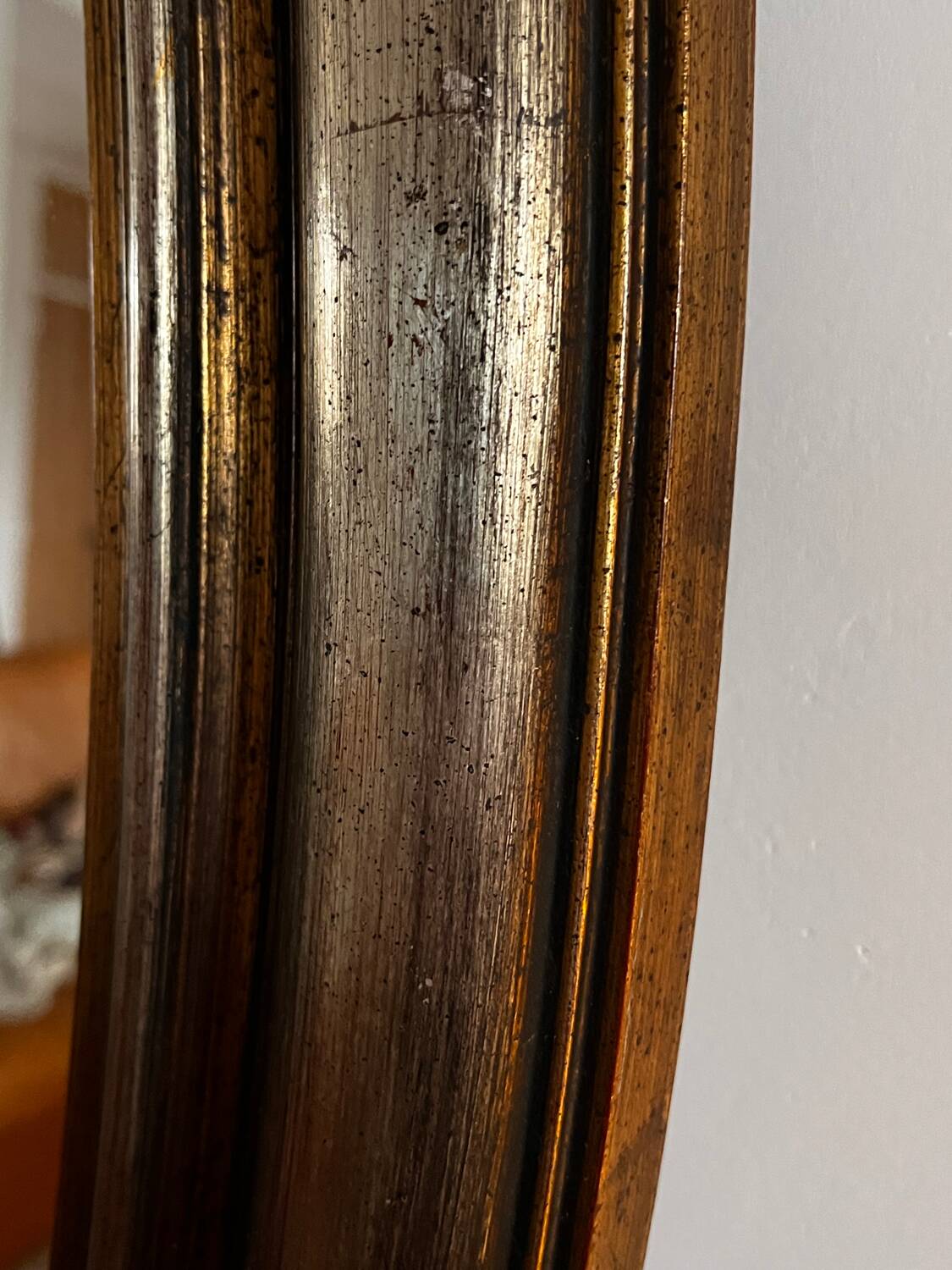 Antique oval mirror made in Belgium.