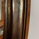 Antique oval mirror made in Belgium.