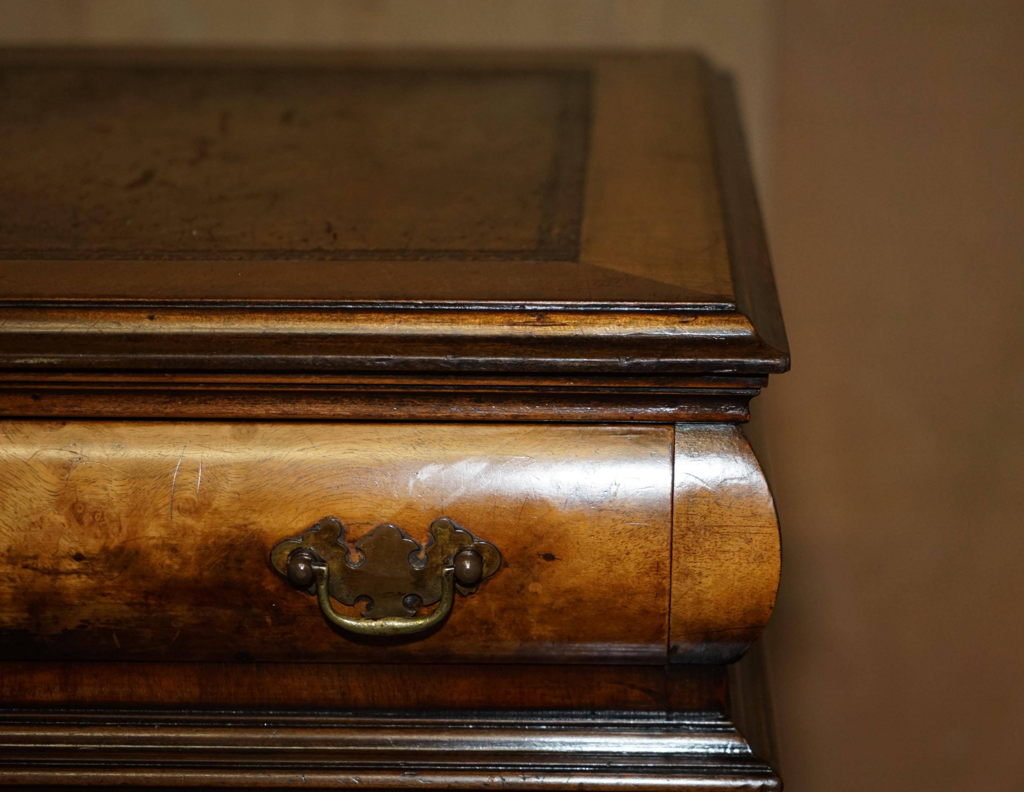 Victorian antique partner's desk in veined walnut with a leather top.